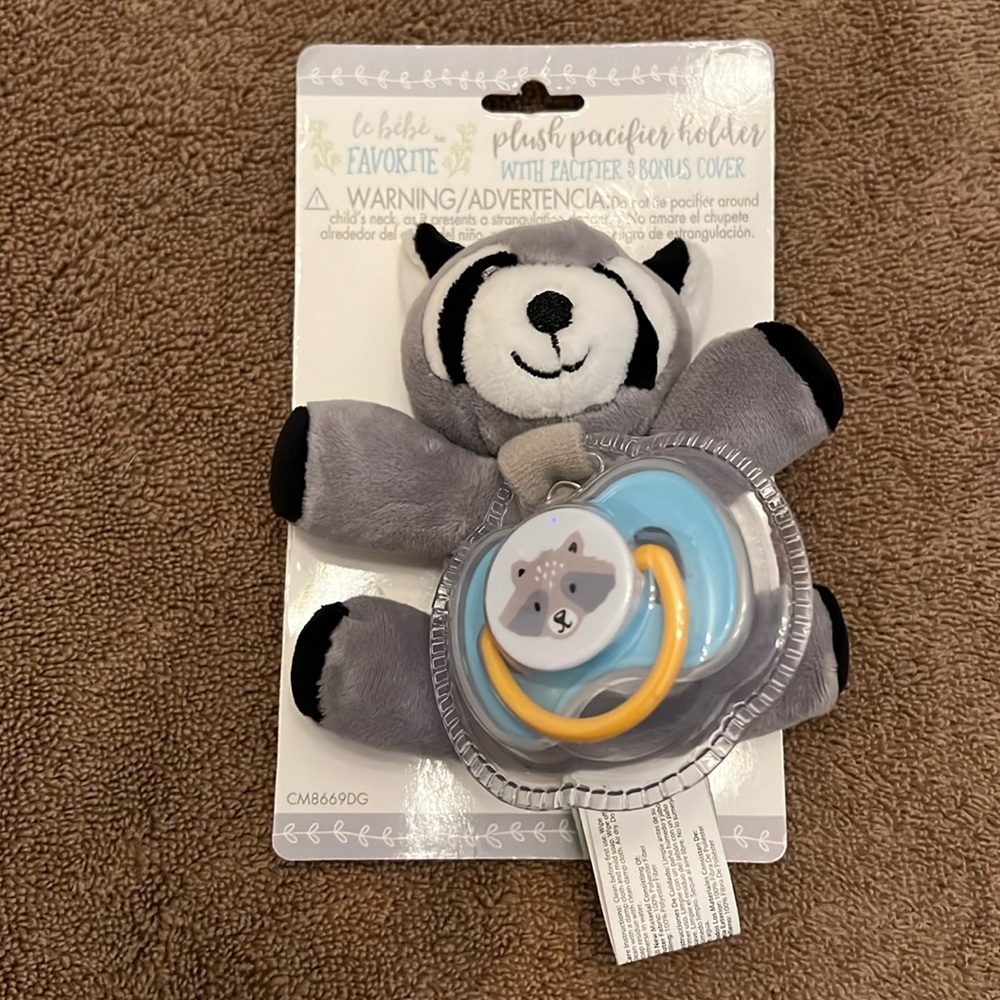 Le Bebe plush pacifier holder with pacifier